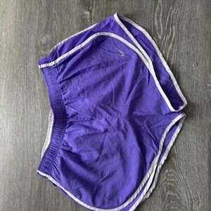 Purple Nike shorts with built in mesh underwear